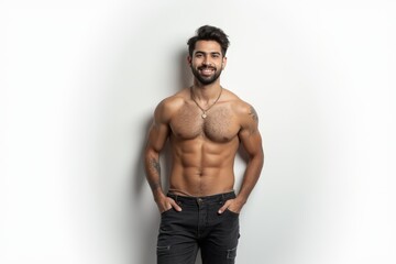 Fototapeta premium Half-Length (Waist-Up) portrait of young stylish smiling Jordanian male model in sexy wear isolated on pure white background looking at camera