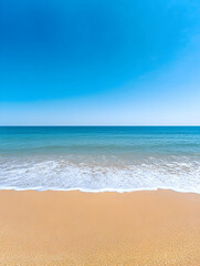 Obraz premium Tranquil beach scene under a clear blue sky
