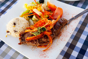 Tasty entrecote with rice and vegetables. High quality photo