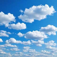 Naklejka premium Misty clouds float against azure sky.