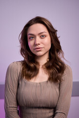 Fototapeta premium Stylish Young Woman Captured in a Modern Office Setting, Exuding Charm and Confidence