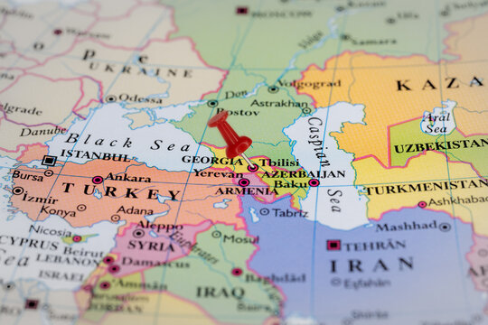 Colorful tourist location map with red stick pin at  Tbilisi, Georgia, and the surrounding countries