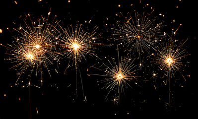 Obraz premium Sparkling Bright Sparklers Against Dark Background for Celebration or Holiday