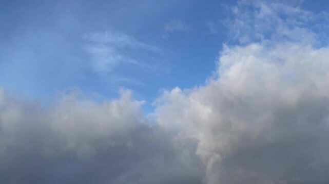 Movement of cumulus clouds in the morning sky. Fourfold acceleration. Majorca Island. Spain.