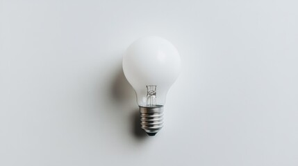 A minimalist LED bulb with a neutral white light tone, white background