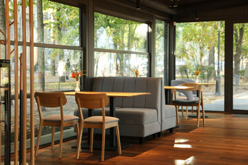 Stylish cafe with large windows. Interior design