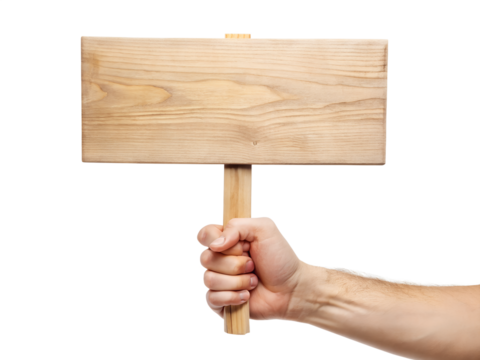 hand holding a wooden sign