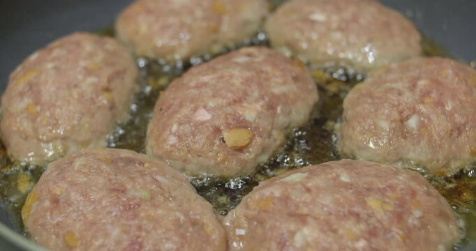 Colettes made of fresh minced meat are fried in oil