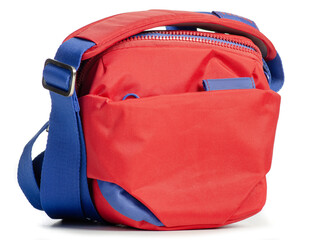 Red shoulder camera bag on white background isolation
