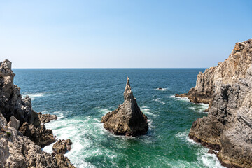 Maruata Beach in the municipality of Aquila, Michoacan, Mexico. el dedo de Dios rock (the finger of God)