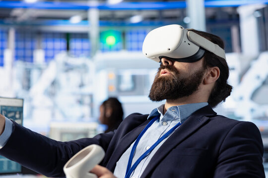 Photovoltaics factory technician utilizing virtual reality tech to optimize production line efficiency. Solar panels plant expert uses VR gear for workflow enhancement of assembly processes, close up