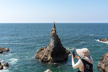 Maruata Beach in the municipality of Aquila, Michoacan, Mexico. el dedo de Dios rock (the finger of God)