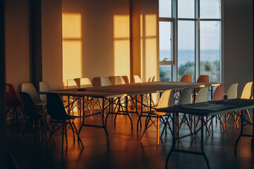empty office auditorium with window, sunny room
