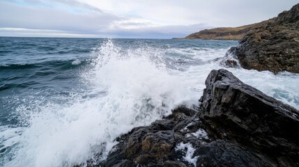 A dramatic coastline with jagged rocks and crashing waves