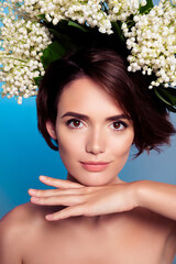 Fototapeta premium Photo of gorgeous lovely lady showing perfect smooth skin isolated on blue color background