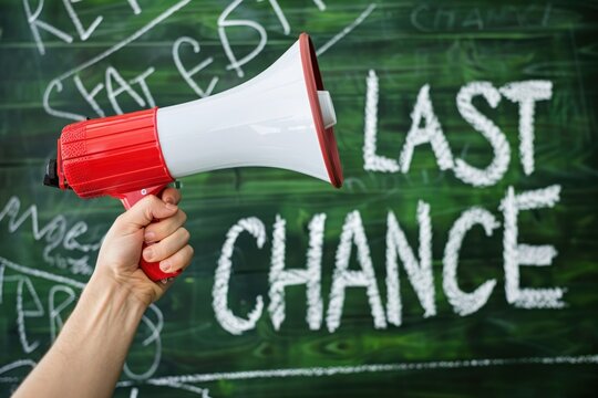 Hand Holding Megaphone with Last Chance Message on Chalkboard Background
