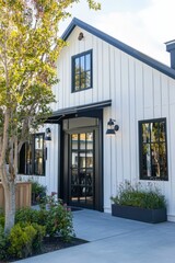 Fototapeta premium Charming modern building with white cladding and large windows surrounded by vibrant greenery in a sunny outdoor setting