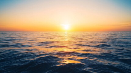 Obraz premium Serene Ocean Sunset: Warm Golden Hues and Calm Waters
