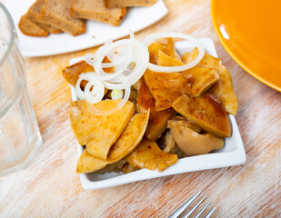 Salad bowl with pickled russula and onions