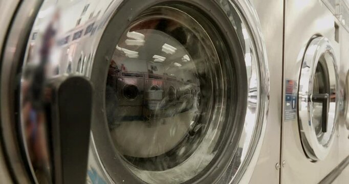 Washing Machines Washing in a Laundromat