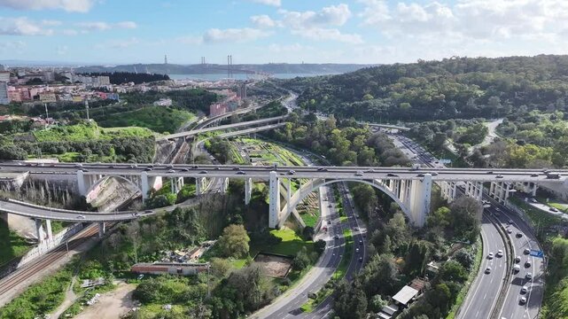 Duarte Pacheco Viaduct At Lisbon In Lisbon District Portugal. Stunning Downtown Cityscape. Cable Bridge Scene. Duarte Pacheco Viaduct At Lisbon In Lisbon District Portugal. Steel Bridge Scenery.