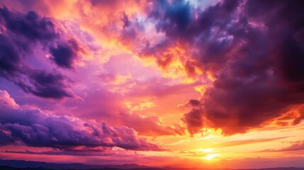 Fototapeta premium Vibrant Sunset Sky with Dramatic Purple and Orange Clouds