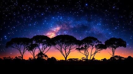 Enchanting celestial nightscape with orion constellation over silhouetted trees.