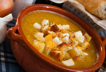 Vegetable soup with croutons and cheese. High quality photo