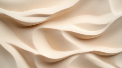 Obraz premium Soft rippling texture of desert sand creates a serene and tranquil landscape under bright sunlight