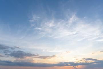 Low angle view and full frame of beautiful morning or evening blue and orange sky with cloudy while sunsets or sunrises taken at the sea used as natural background texture