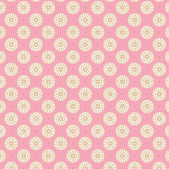 Cream daisy medallions on pink background with tiny dots. Seamless cute floral pattern ideal for children’s fabrics, bedding, wrapping paper, and sweet designs.