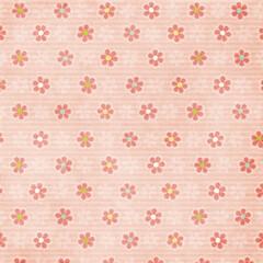 Soft pink vintage floral seamless pattern with colorful center blossoms, textured background ideal for retro fabric, stationery, baby designs, and d&eacute;cor projects.