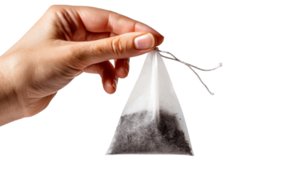 Woman hand holding pyramid tea bag with transparent background