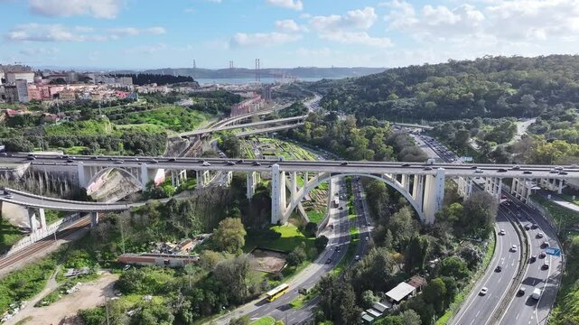 Duarte Pacheco Bridge At Lisbon In Lisbon District Portugal. Infrastructure Scenery. Road Trip Transportation. Duarte Pacheco Bridge At Lisbon In Lisbon District Portugal. Famous Iron Bridge.
