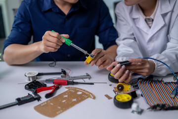 Two people are working on a project together