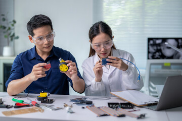 Two people are working on a project together