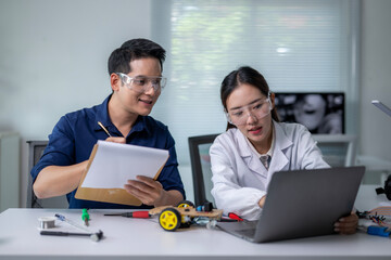 Fototapeta premium Two people are working on a project together