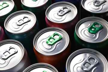 Many aluminium cans of beverage as background, closeup