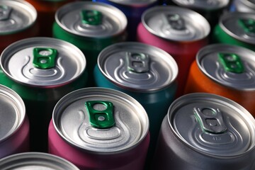 Many aluminium cans of beverage as background, closeup