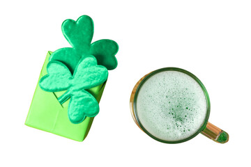 Patrick`s day, gift box decorated with artificial clover leaves and glass of beer isolated on white background, top view, PNG