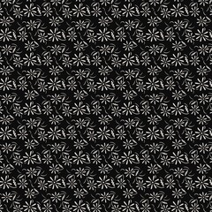 Minimal black-and-white floral silhouette pattern with simple daisy motifs, perfect for modern textiles, wrapping paper, and decorative themes.