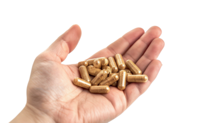 Hand holding herbal supplement capsules with transparent background