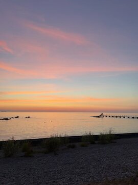 sunset on the beach in finlands archipelago