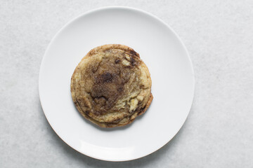 Overhead view of cinnamon cookies, top view of cinnamon vanilla cookies, process of making bakery style cookies