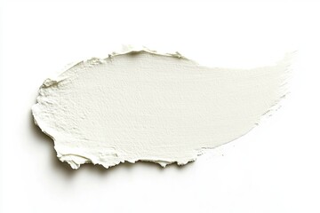 Creamy, light-toned cosmetic smudge on white background