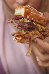 Delicious gourmet burger with melted cheese and crispy onions