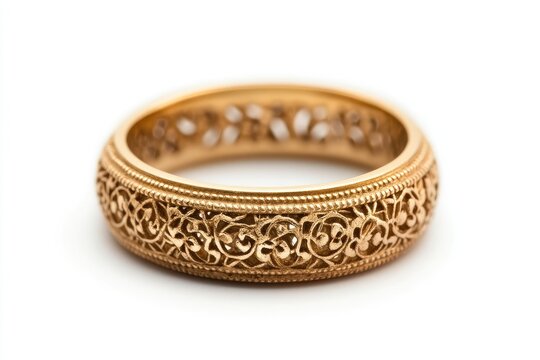 Ornate gold ring on white background (1)