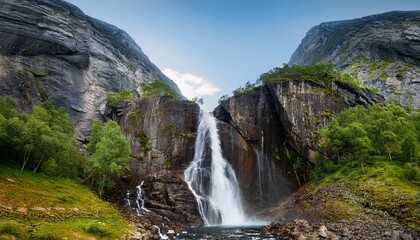 Obraz premium waterfall betwen rock walls in the norwegian mountains