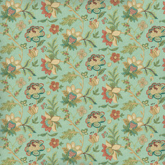 Colorful vintage floral pattern on teal background with intricate botanical motifs. Perfect for fabric design, wallpaper, and home decor.