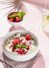 cottage cheese with raspberries and almond petals